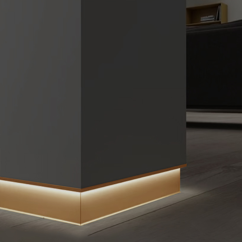 Recessed baseboard with downward lighting