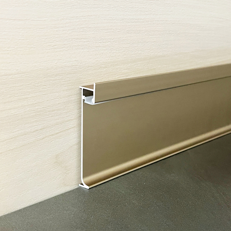 Recessed baseboard with downward lighting
